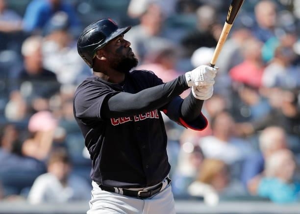 Franmil Reyes of the Cleveland Indians follows through on his sixth inning two run home run against the New York Yankees at Yankee Stadium on...
