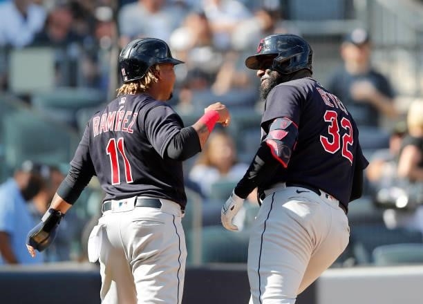 Franmil Reyes of the Cleveland Indians celebrates his sixth inning two run home run against the New York Yankees with teammate Jose Ramirez at Yankee...