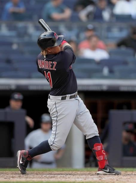 Jose Ramirez of the Cleveland Indians follows through on his eighth inning home run against the New York Yankees at Yankee Stadium on September 18,...