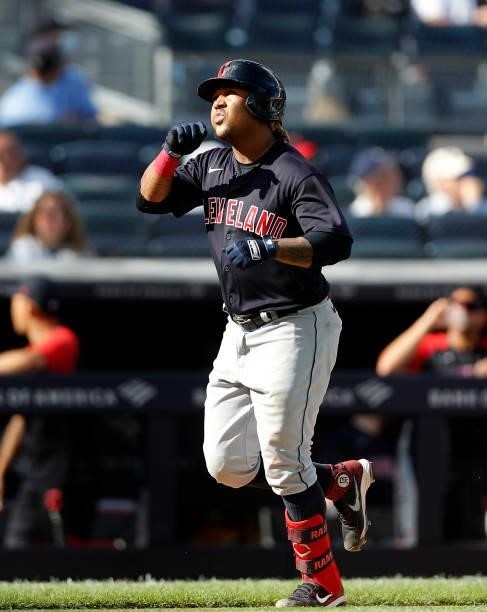 Jose Ramirez of the Cleveland Indians reacts as he runs the bases after his eighth inning home run against the New York Yankees at Yankee Stadium on...