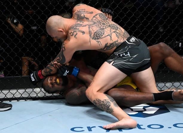 Anthony Smith punches Ryan Spann in a light heavyweight fight during the UFC Fight Night event at UFC APEX on September 18, 2021 in Las Vegas, Nevada.