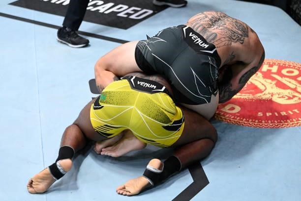 Anthony Smith secures a rear choke submission against Ryan Spann in a light heavyweight fight during the UFC Fight Night event at UFC APEX on...