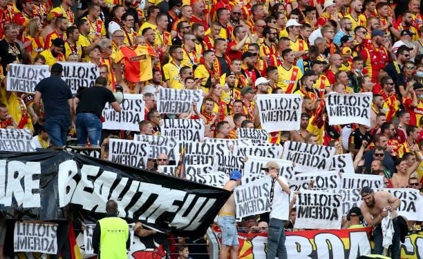 Supporters of Lens insulting supporters of Lille with 'Lillois merda' during the Ligue 1 Uber Eats match between RC Lens and Lille OSC at Stade...