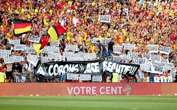 Supporters of Lens insulting supporters of Lille with 'Lillois merda' during the Ligue 1 Uber Eats match between RC Lens and Lille OSC at Stade...