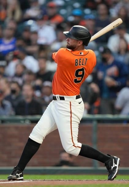Brandon Belt of the San Francisco Giants hits a two-run home run against the Atlanta Braves in the bottom of the first inning at Oracle Park on...