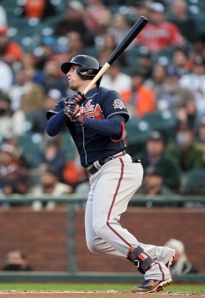 Austin Riley of the Atlanta Braves hits a single against the San Francisco Giants in the top of the first inning at Oracle Park on September 17, 2021...