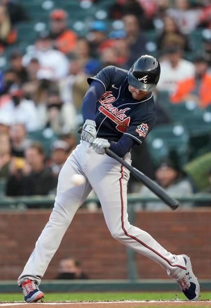 Freddie Freeman of the Atlanta Braves hits a single against the San Francisco Giants in the top of the first inning at Oracle Park on September 17,...