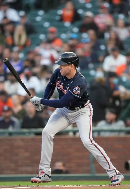 Freddie Freeman of the Atlanta Braves hits a single against the San Francisco Giants in the top of the first inning at Oracle Park on September 17,...