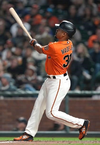 LaMonte Wade Jr. #31 of the San Francisco Giants hits a solo home run against the Atlanta Braves in the bottom of the fourth inning at Oracle Park on...