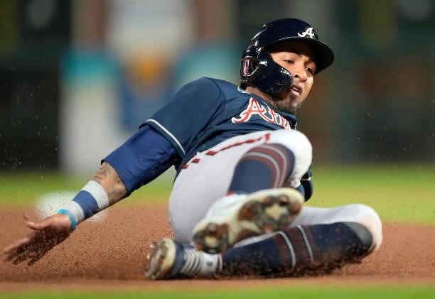 Atlanta Braves slides into third base safe against the San Francisco Giants in the top of the fourth inning at Oracle Park on September 17, 2021 in...