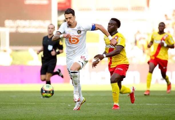Jose Fonte of Lille, Arnaud Kalimuendo of Lens during the Ligue 1 Uber Eats match between RC Lens and Lille OSC at Stade Bollaert-Delelis on...
