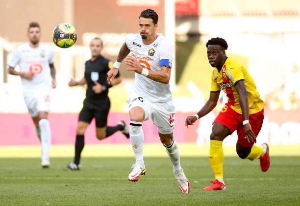 Jose Fonte of Lille, Arnaud Kalimuendo of Lens during the Ligue 1 Uber Eats match between RC Lens and Lille OSC at Stade Bollaert-Delelis on...