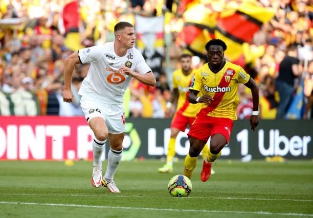 Sven Botman of Lille, Arnaud Kalimuendo of Lens during the Ligue 1 Uber Eats match between RC Lens and Lille OSC at Stade Bollaert-Delelis on...