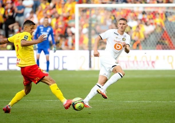 Sven Botman of Lille, Florian Sotoca of Lens during the Ligue 1 Uber Eats match between RC Lens and Lille OSC at Stade Bollaert-Delelis on September...
