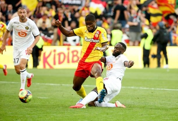 Jonathan Ikone of Lille, Kevin Danso of Lens during the Ligue 1 Uber Eats match between RC Lens and Lille OSC at Stade Bollaert-Delelis on September...