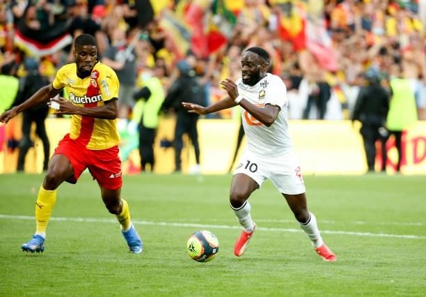 Jonathan Ikone of Lille, Kevin Danso of Lens during the Ligue 1 Uber Eats match between RC Lens and Lille OSC at Stade Bollaert-Delelis on September...