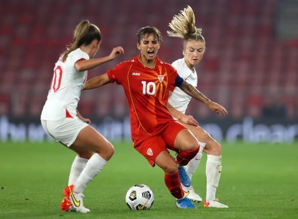 Natasha Andonova of North Macedonia is tackled by Leah Williamson of England during the FIFA Women's World Cup 2023 Qualifier group D match between...