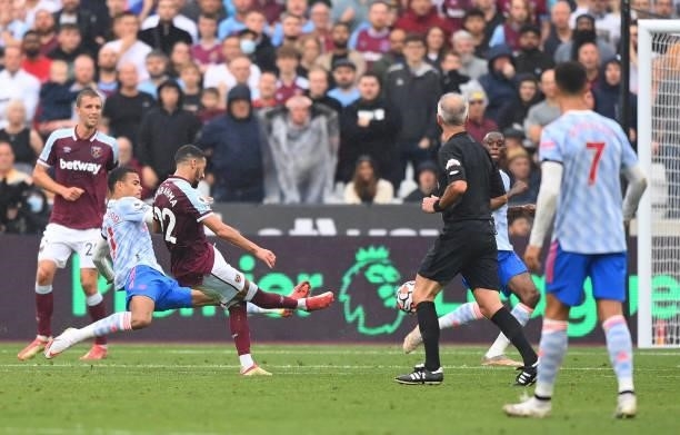 Said Benrahma of West Ham United scores their side's first goal during the Premier League match between West Ham United and Manchester United at...