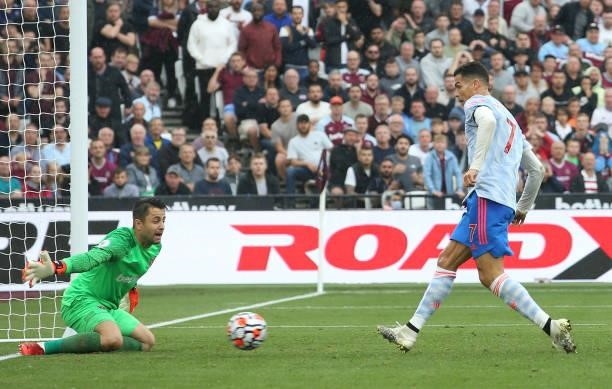 Cristiano Ronaldo of Manchester United scores their first goal during the Premier League match between West Ham United and Manchester United at...
