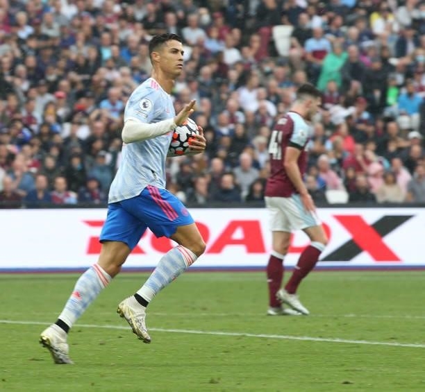Cristiano Ronaldo of Manchester United celebrates scoring their first goal during the Premier League match between West Ham United and Manchester...