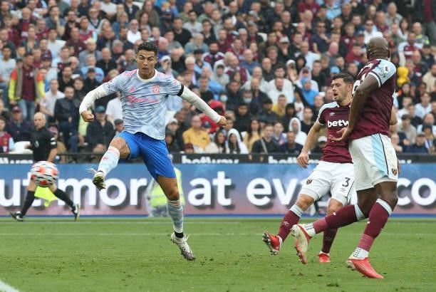 Cristiano Ronaldo of Manchester United in action with Angelo Ogbonna of West Ham United during the Premier League match between West Ham United and...