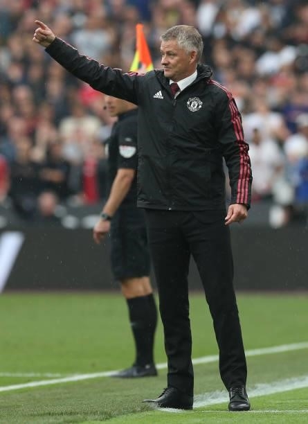 Manager Ole Gunnar Solskjaer of Manchester United watches from the touchline during the Premier League match between West Ham United and Manchester...