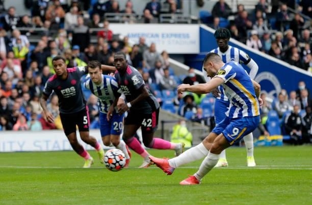 Neal Maupay of Brighton & Hove Albion scores their side's first goal from the penalty spot during the Premier League match between Brighton & Hove...