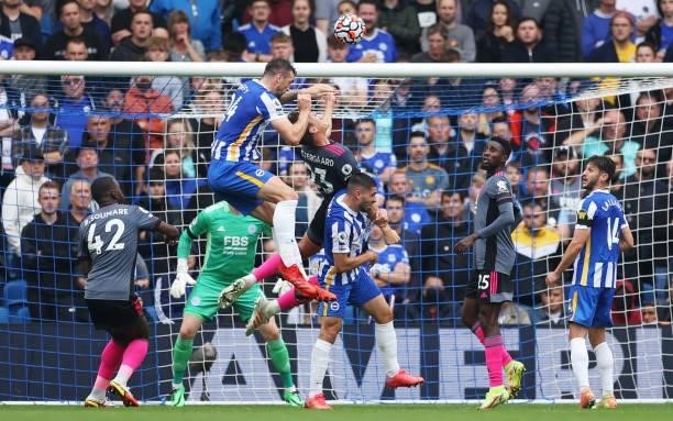 Jannik Vestergaard of Leicester City is adjudged to have handled the ball following a VAR check leading to a penalty being awarded to Brighton & Hove...