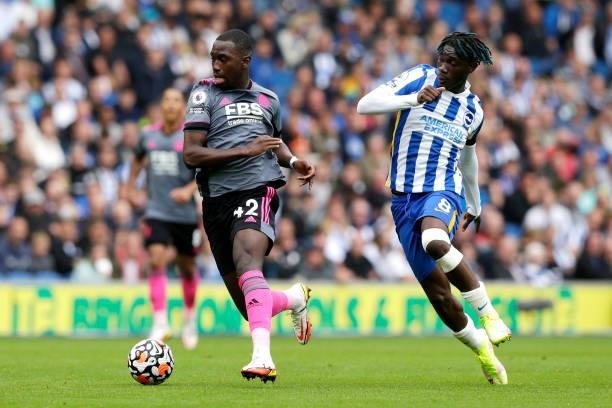 Boubakary Soumare of Leicester City battles for possession with Yves Bissouma of Brighton & Hove Albion during the Premier League match between...