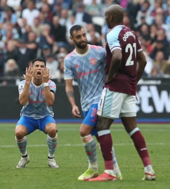 Cristiano Ronaldo of Manchester United shows his frustration at not being awarded a penalty during the Premier League match between West Ham United...