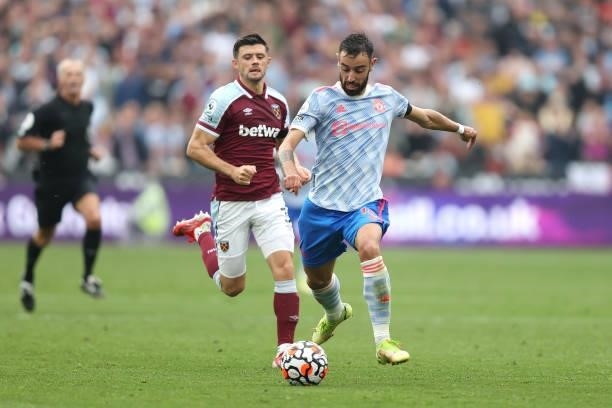 Bruno Fernandes of Manchester United runs with the ball during the Premier League match between West Ham United and Manchester United at London...