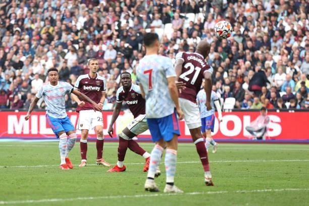 Jesse Lingard of Manchester United scores their team's second goal during the Premier League match between West Ham United and Manchester United at...