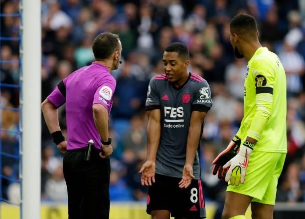 Youri Tielemans of Leicester City argues with referee Stuart Atwell during the Premier League match between Brighton & Hove Albion and Leicester City...