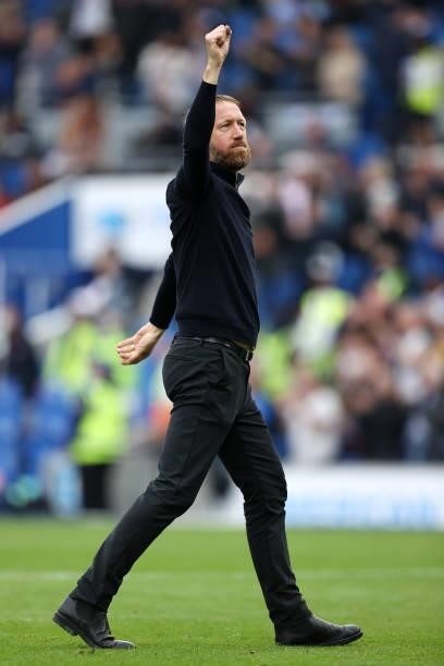 Graham Potter, Manager of Brighton & Hove Albion acknowledges the fans after his sides victory in the Premier League match between Brighton & Hove...