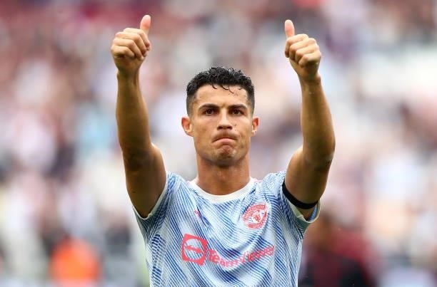 Christiano Ronaldo of Manchester United celebrates to the fans at the end of the Premier League match between West Ham United and Manchester United...