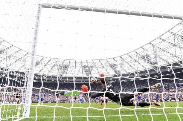 David De Gea of Manchester United saves the penalty taken by Mark Noble of West Ham United during the Premier League match between West Ham United...