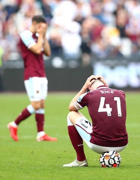 Declan Rice and Aaron Cresswell of West Ham United react after the Premier League match between West Ham United and Manchester United at London...
