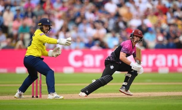 Tom Abell of Somerset hits runs watched on by Lewis McManus of Hampshire during the Semi-Final of the Vitality T20 Blast match between Hampshire...