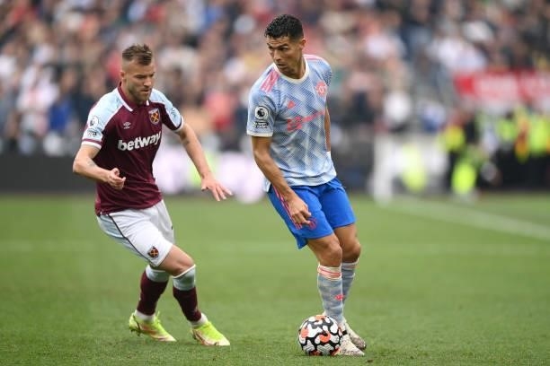 Cristiano Ronaldo of Manchester United and Andriy Yarmolenko of West Ham United during the Premier League match between West Ham United and...