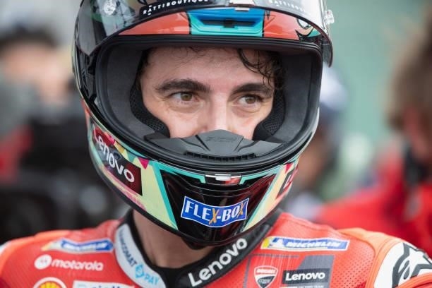 Francesco Bagnaia of Italy and Ducati Lenovo Team celebrates the victory under the podium during the MotoGP race during the MotoGP Of San Marino -...