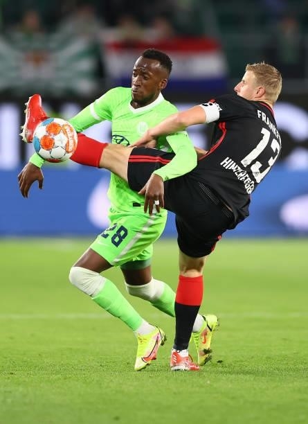 Dodi Lukebakio of Wolfsburg fights for the ball with Martin Hinteregger of Frankfurt during the Bundesliga match between VfL Wolfsburg and Eintracht...