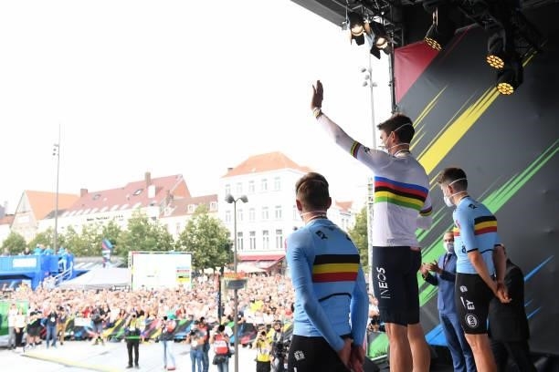 Bronze medalist Remco Evenepoel of Belgium, Gold medalist Filippo Ganna of Italy and Silver medalist Wout Van Aert of Belgium pose and wave the fans...