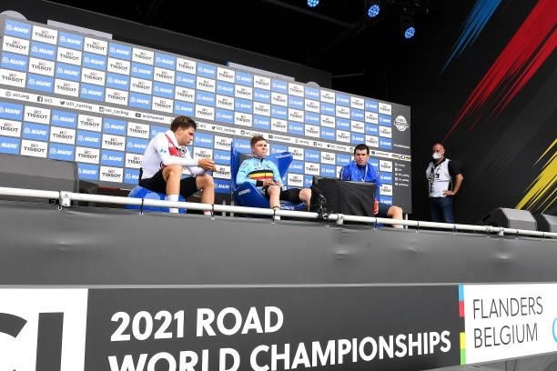 Stefan Bissegger of Switzerland, Remco Evenepoel of Belgium and Edoardo Affini of Italy wait for rivals results in the hot-seat after competing in...