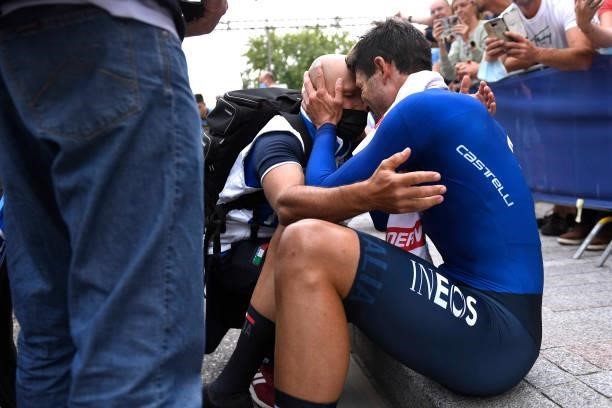Filippo Ganna of Italy celebrates with a team staff member as race winner after the 94th UCI Road World Championships 2021 - Men Elite ITT a 43,3km...