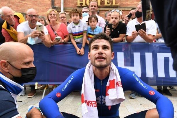 Filippo Ganna of Italy celebrates with a team staff member as race winner after the 94th UCI Road World Championships 2021 - Men Elite ITT a 43,3km...