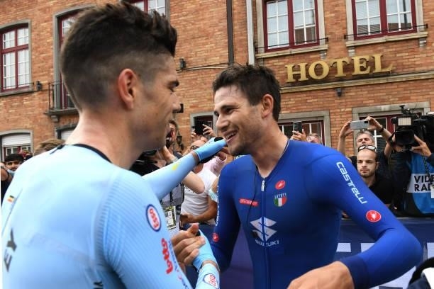 Wout Van Aert of Belgium congratulates Filippo Ganna of Italy as race winner after the 94th UCI Road World Championships 2021 - Men Elite ITT a...
