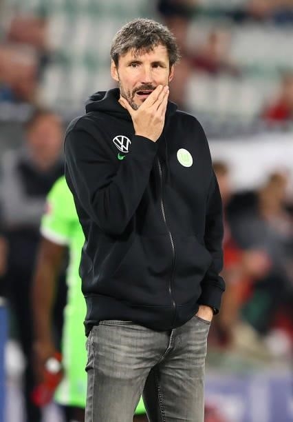 Team coach Mark van Bommel of Wolfsburg reacts during the Bundesliga match between VfL Wolfsburg and Eintracht Frankfurt at Volkswagen Arena on...