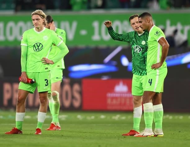 Sebastiaan Bornauw , Maxence Lacroix and teammates of Wolfsburg react after the 1-1 draw of the Bundesliga match between VfL Wolfsburg and Eintracht...