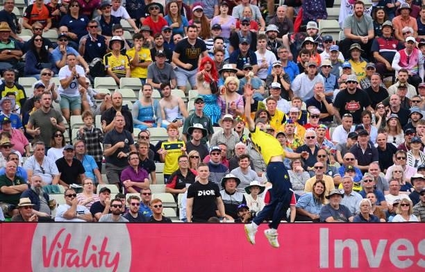 Fans watch on as James Fuller of Hampshire attempts a catch during the Semi-Final of the Vitality T20 Blast match between Hampshire Hawks and...
