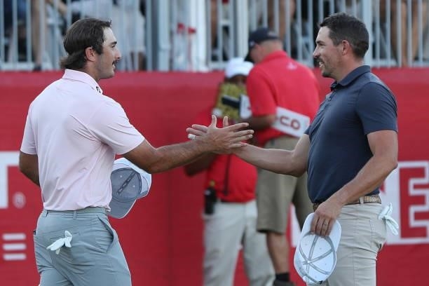 Max Homa shakes hands with Scott Stallings following their final round in the Fortinet Championship at Silverado Resort and Spa on September 19, 2021...